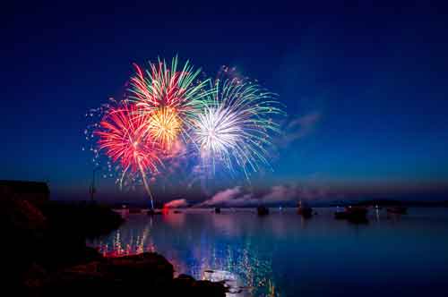 Watching 4th July Fireworks aboard rental boat at 3 mile harbor