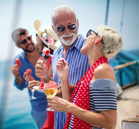 Happy family enjoying a private sailing charter on the Valkyrie catamaran in the Hamptons